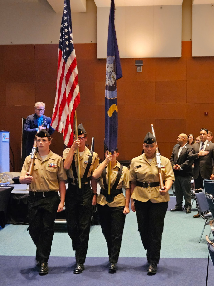 NNDCC students holding Flags